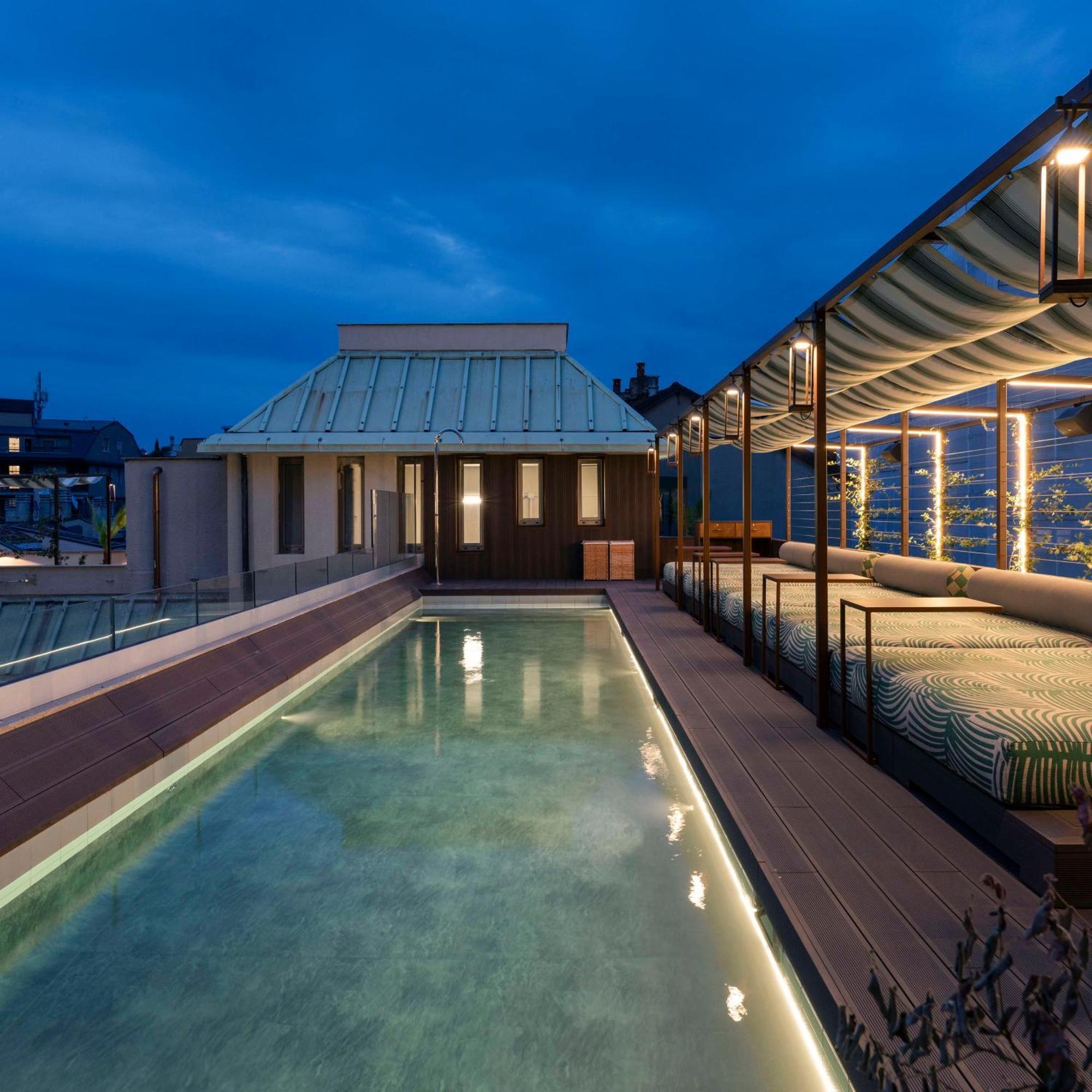 Radisson Collection Hotel, Santa Sofia Milan Exterior photo The rooftop pool at the Mandarin Oriental, Munich